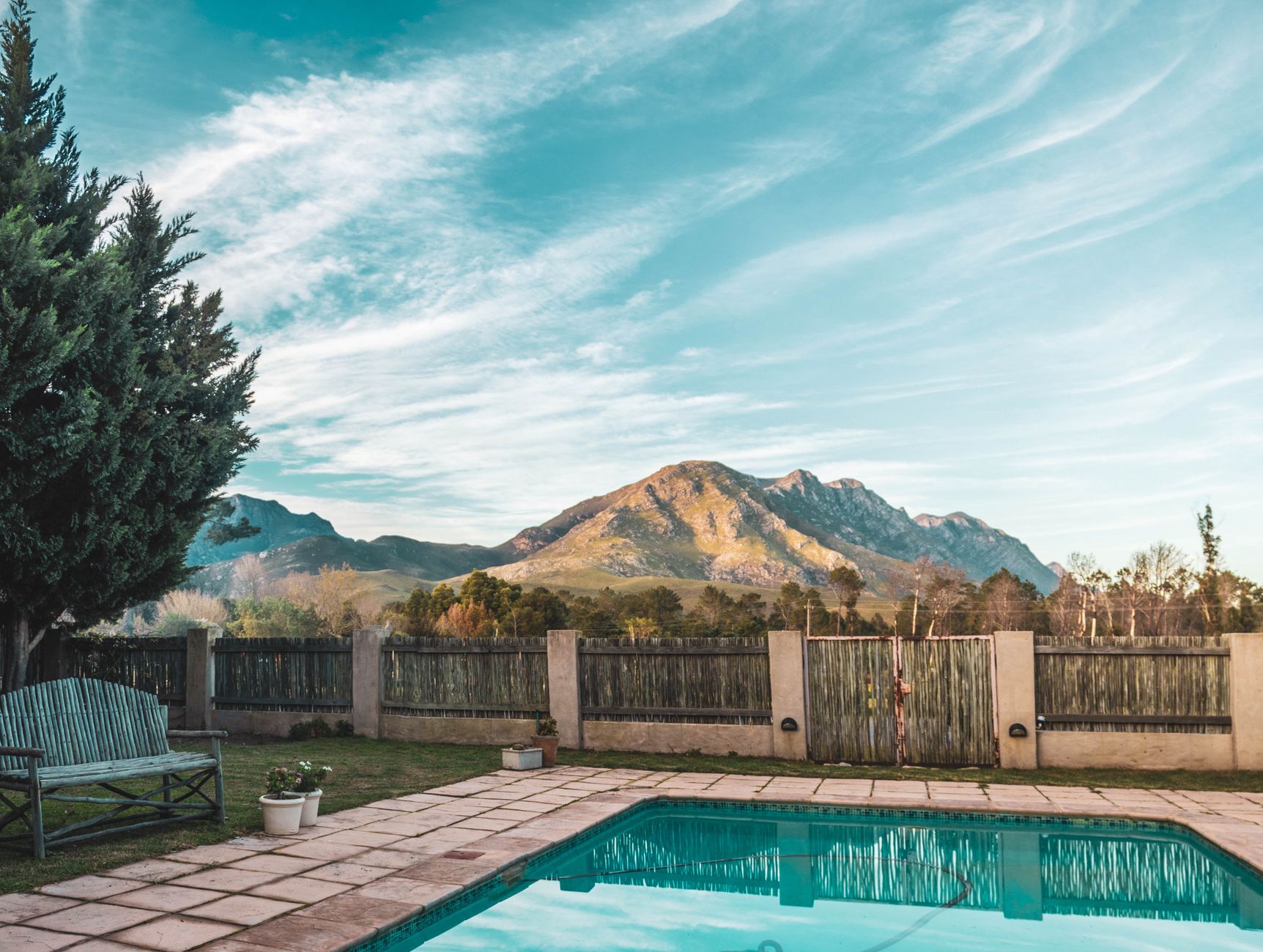 Modern inground pool with clear blue water